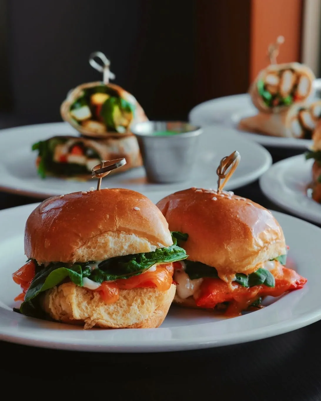 Butter chicken sliders and wraps plated for lunch